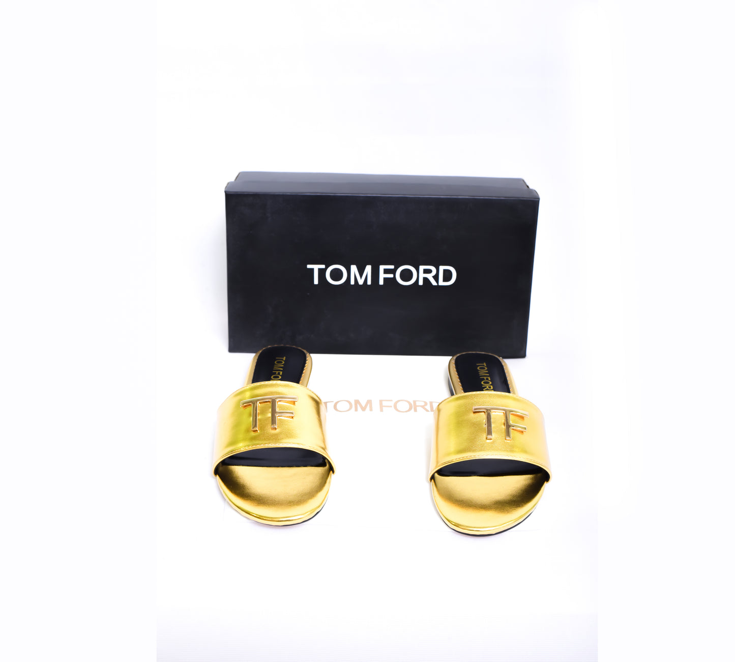 Tom Ford Golden Logo Slides