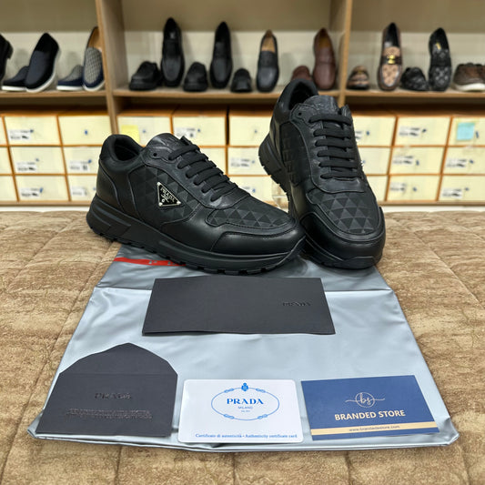 Prada Leather and Re-Nylon high top sneakers - Black
